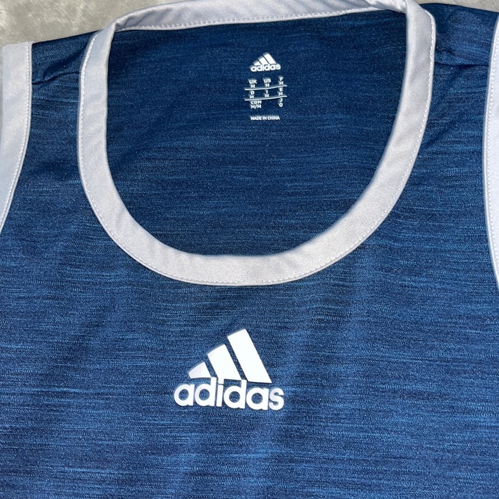 Mens adidas tank top size medium selling for 13$